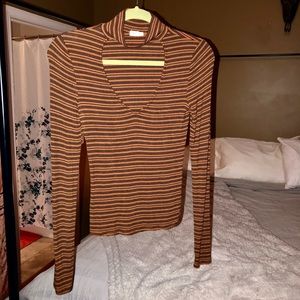 70’s vibe, striped turtleneck.